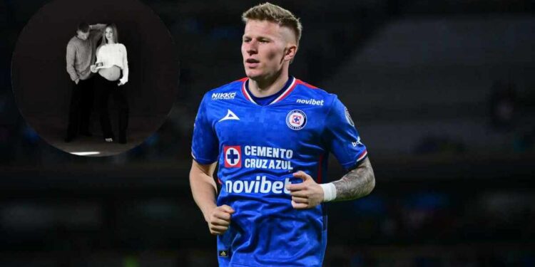 Mateusz Bogusz con su pareja mostrando ultrasonido